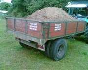LOADS OF TOPSOIL & STONE.